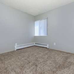 Carpeted secondary bedroom at The Oslo, located in Northglenn, CO